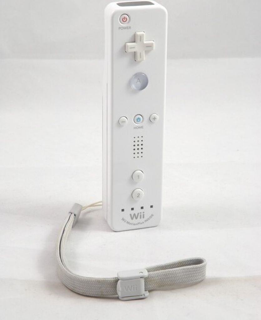 A white Nintendo Wii remote with a wrist strap attached, placed on a white background.