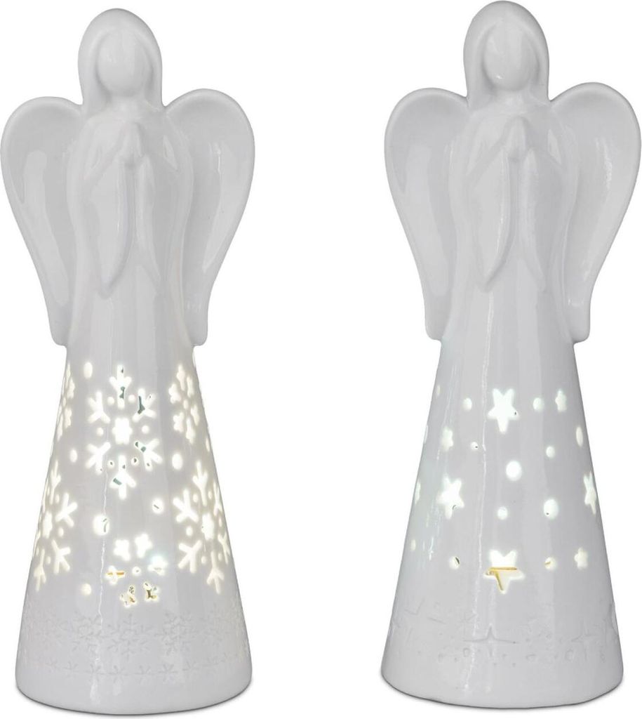 Two white ceramic angel figurines with cut-out designs illuminated from within.