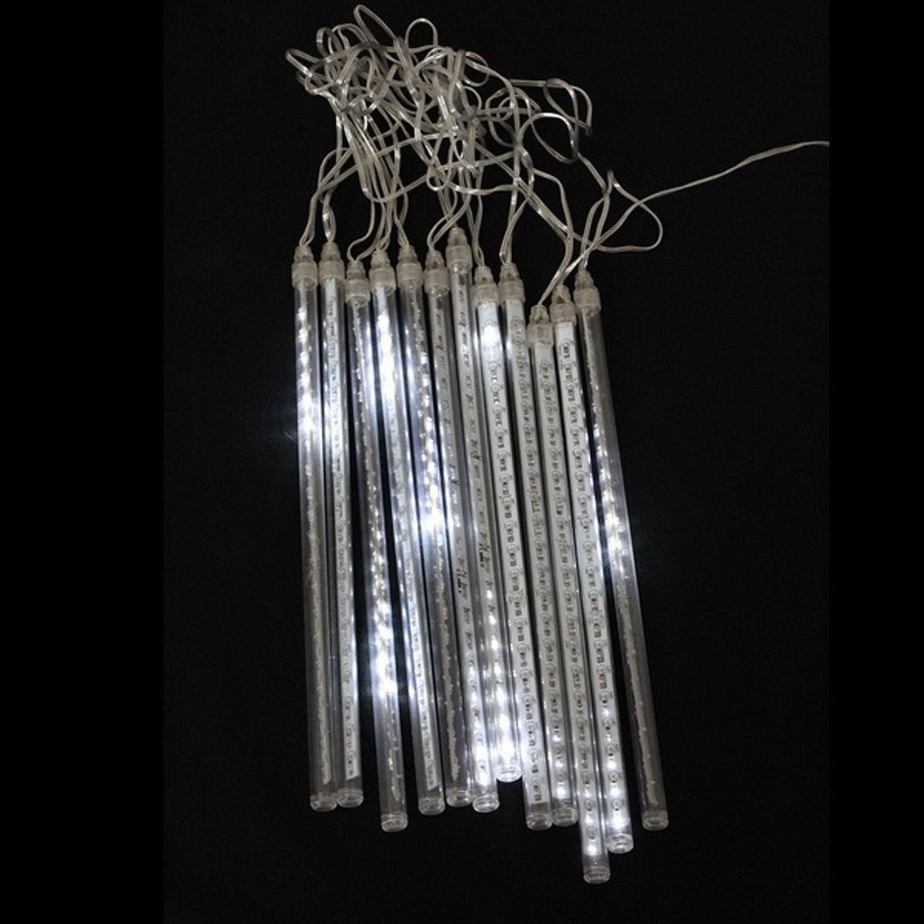 A string of white LED icicle lights against a black background.
