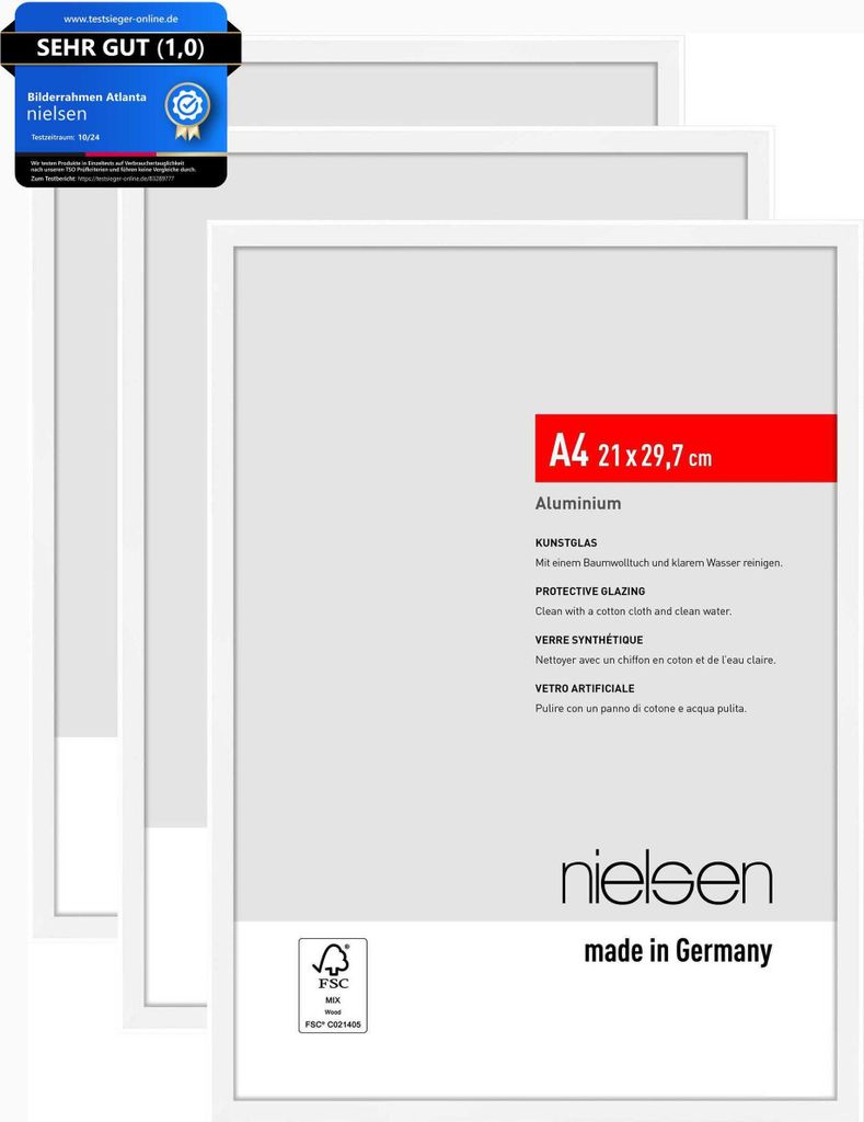 A stack of white Nielsen picture frames, with one frame in the foreground displaying product information.