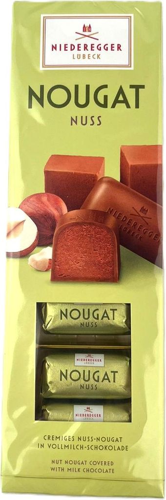 A package of Niederegger Nougat Nuss chocolates with images of the chocolates and hazelnuts.