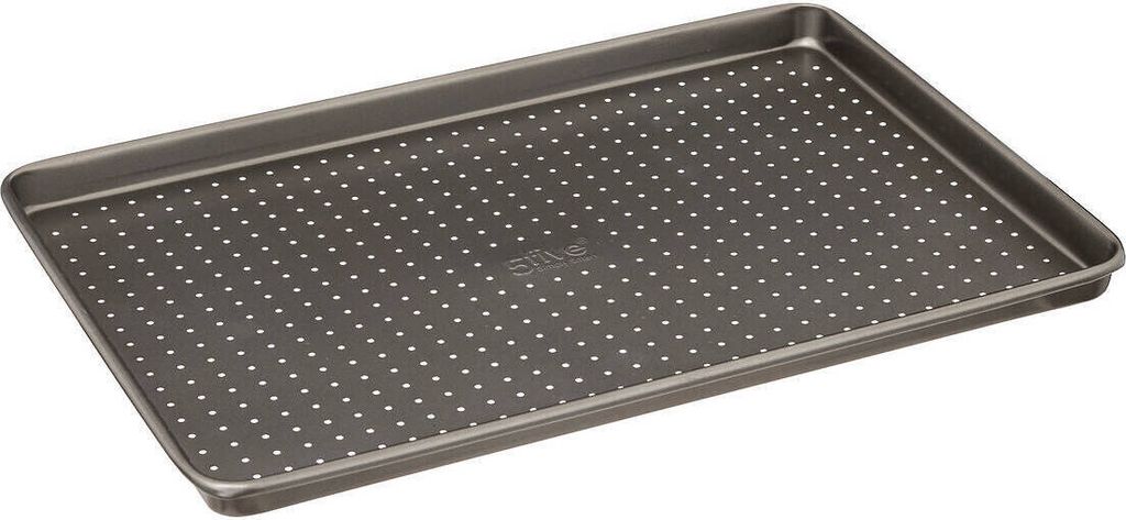 A perforated baking sheet on a gray background.