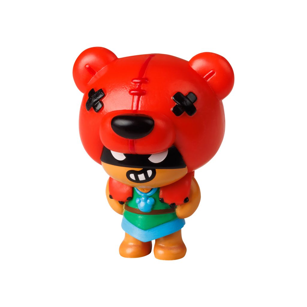 A small toy figurine of a bear character with a red hood and green clothing.