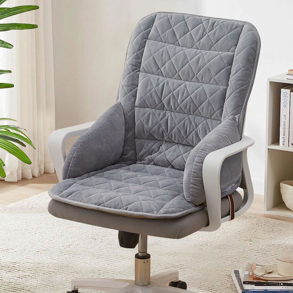 A gray office chair cushion with a quilted pattern is shown on an office chair.