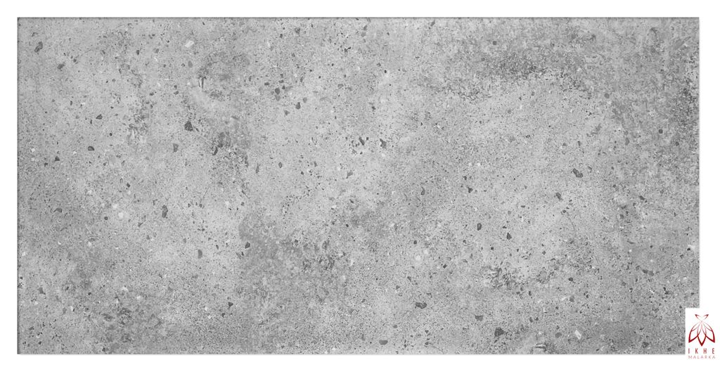 A close-up of a concrete-like textured surface.
