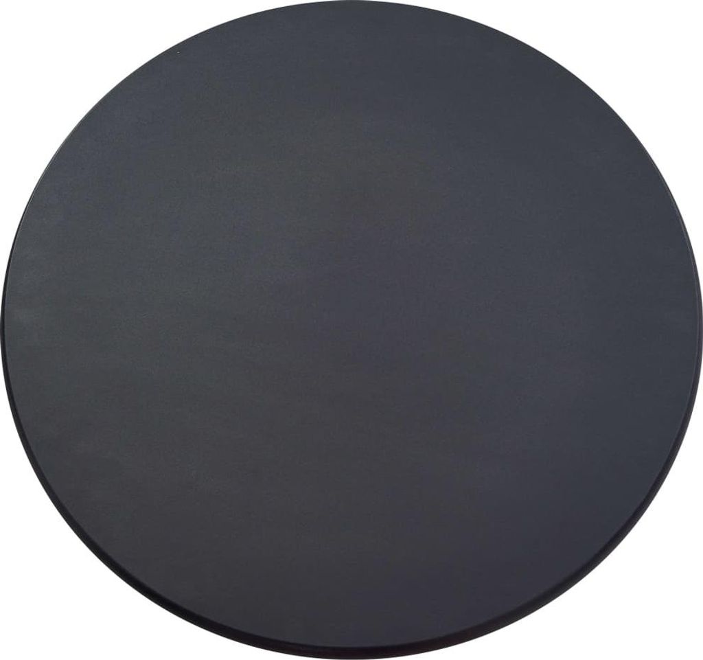 A top-down view of a black circular table top.