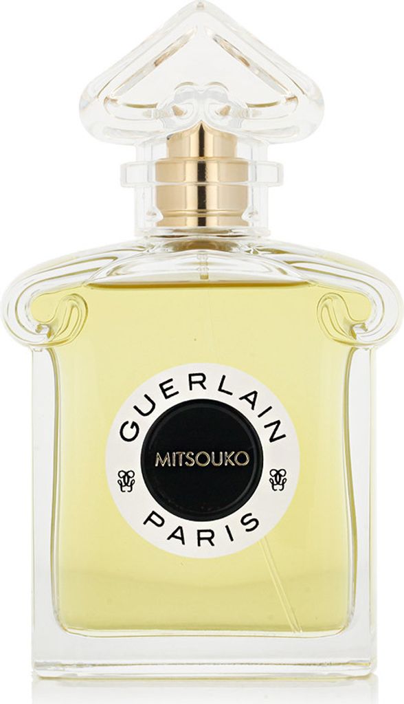 A clear, front-facing studio shot of a Guerlain Mitsouko perfume bottle.