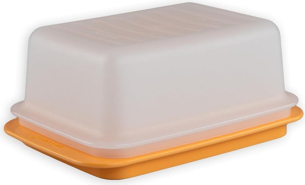 A butter dish with a transparent lid and a yellow base, shown on a white background.