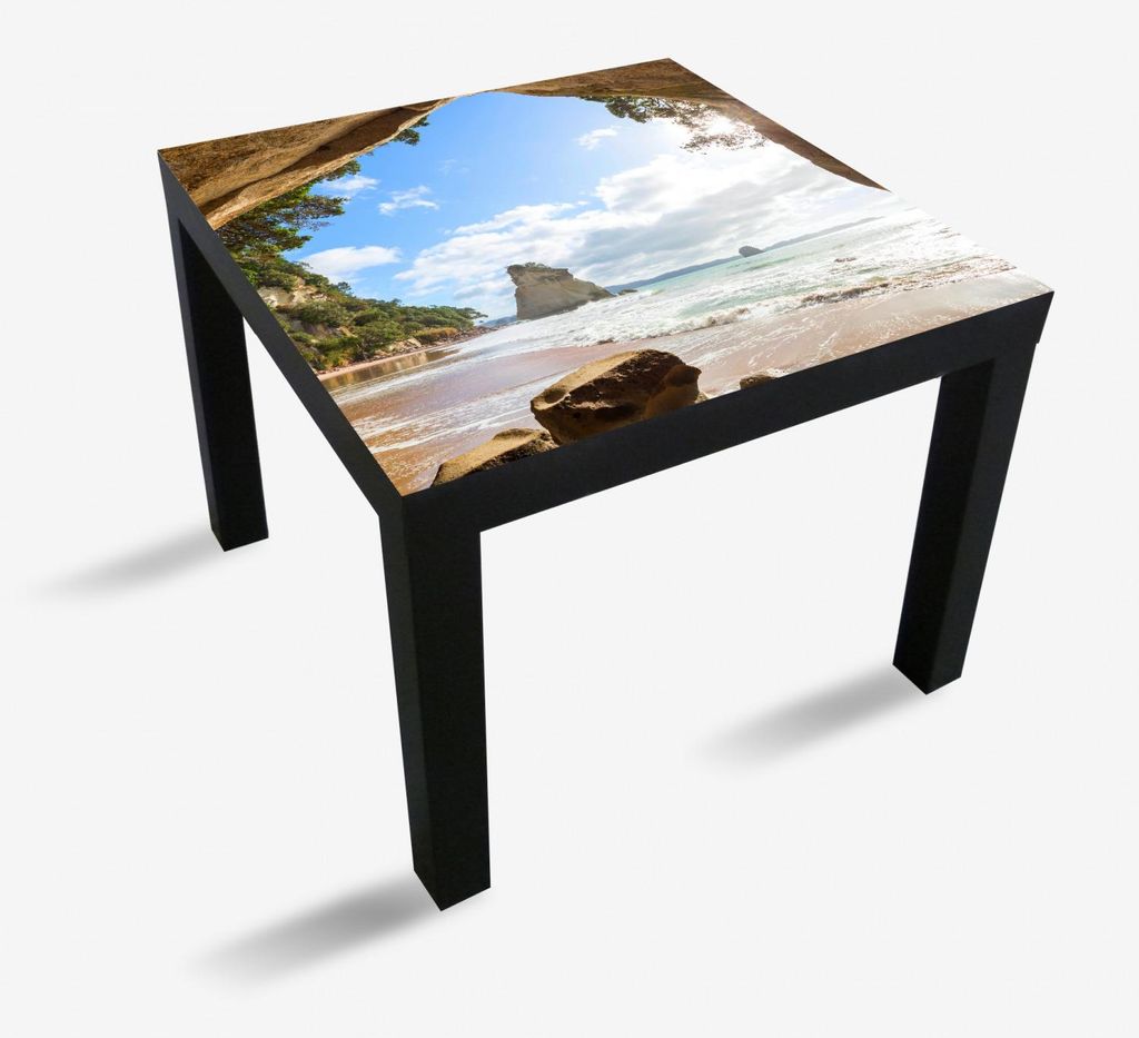 Wallario Möbeldesign / Aufkleber, geeignet für Ikea Lack Tisch - Felsbogen mit Blick aufs Meer in 55 x 55 cm