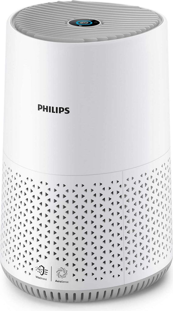 A white Philips air purifier with a perforated base sits on a white background.