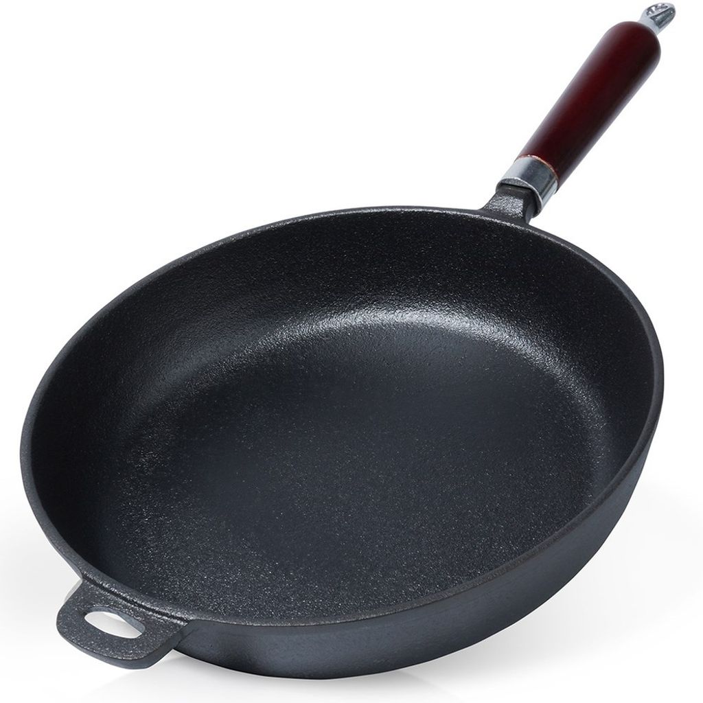 A black cast iron frying pan with a wooden handle is shown against a white background.