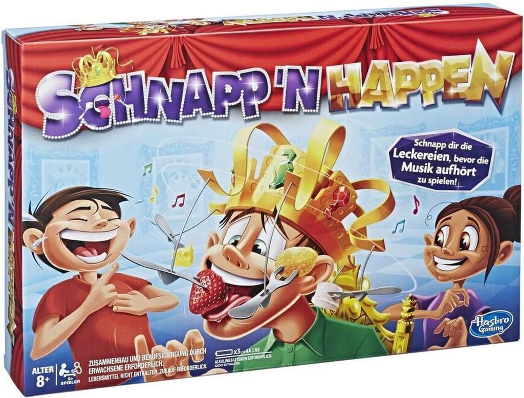 The image shows the box art for the board game "Schnapp 'n Happen". It features cartoon characters and game elements.