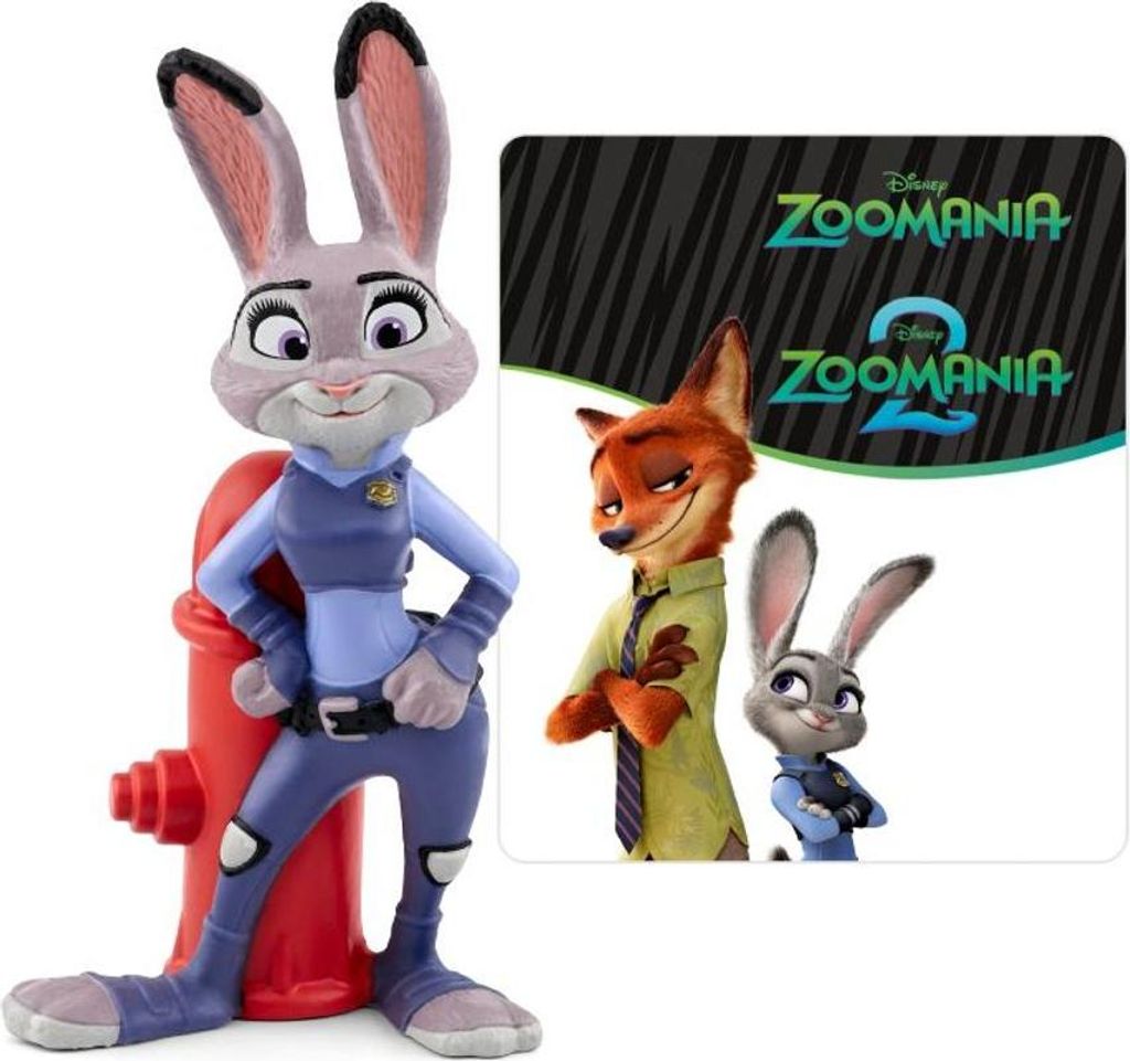 A figurine of Judy Hopps from Zootopia next to a promotional card featuring Nick Wilde and Judy Hopps.