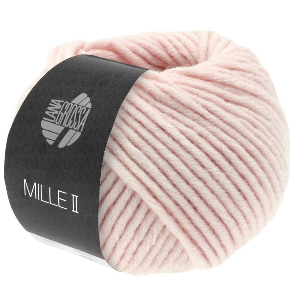 A ball of pink yarn with a black label.