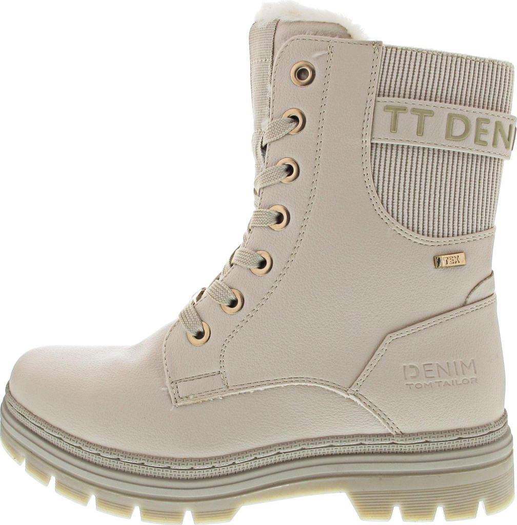 A studio shot of a single beige boot.