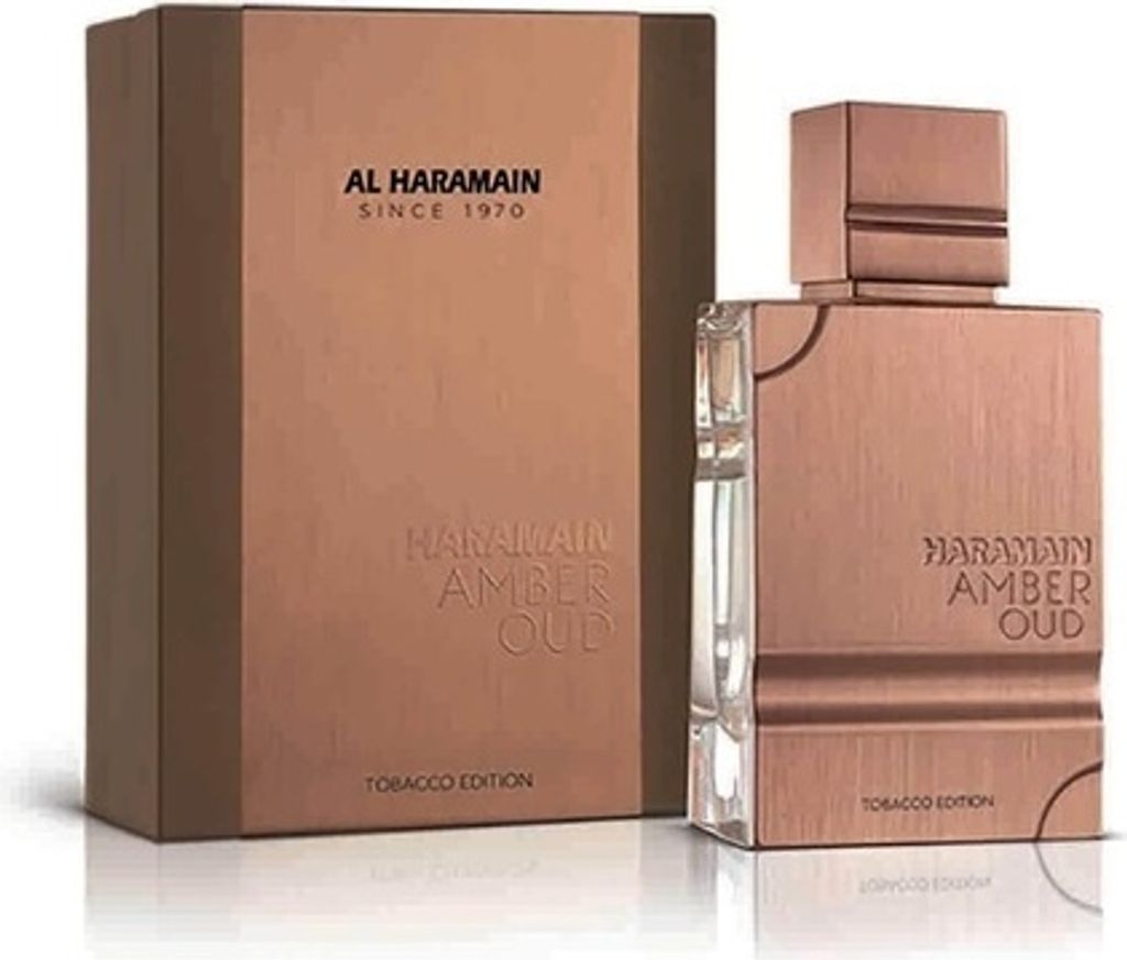 A bottle of Al Haramain Amber Oud Tobacco Edition Eau de Parfum and its packaging are displayed on a white background.