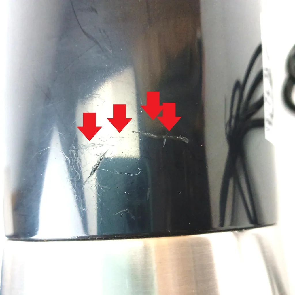 Moulin à café DeLonghi KG210 système Push-to-grind et lames inox - 4