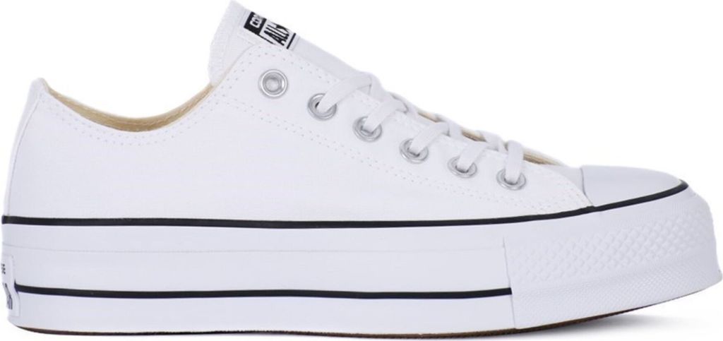 A white Converse Chuck Taylor All Star Lift Ox sneaker with a platform sole is shown from the side against a white background.
