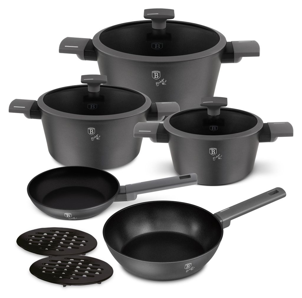 A set of cookware arranged on a white background.