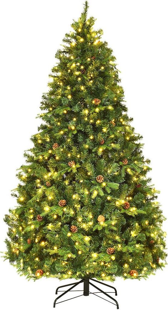 A decorated artificial Christmas tree with lights and pinecones on a white background.