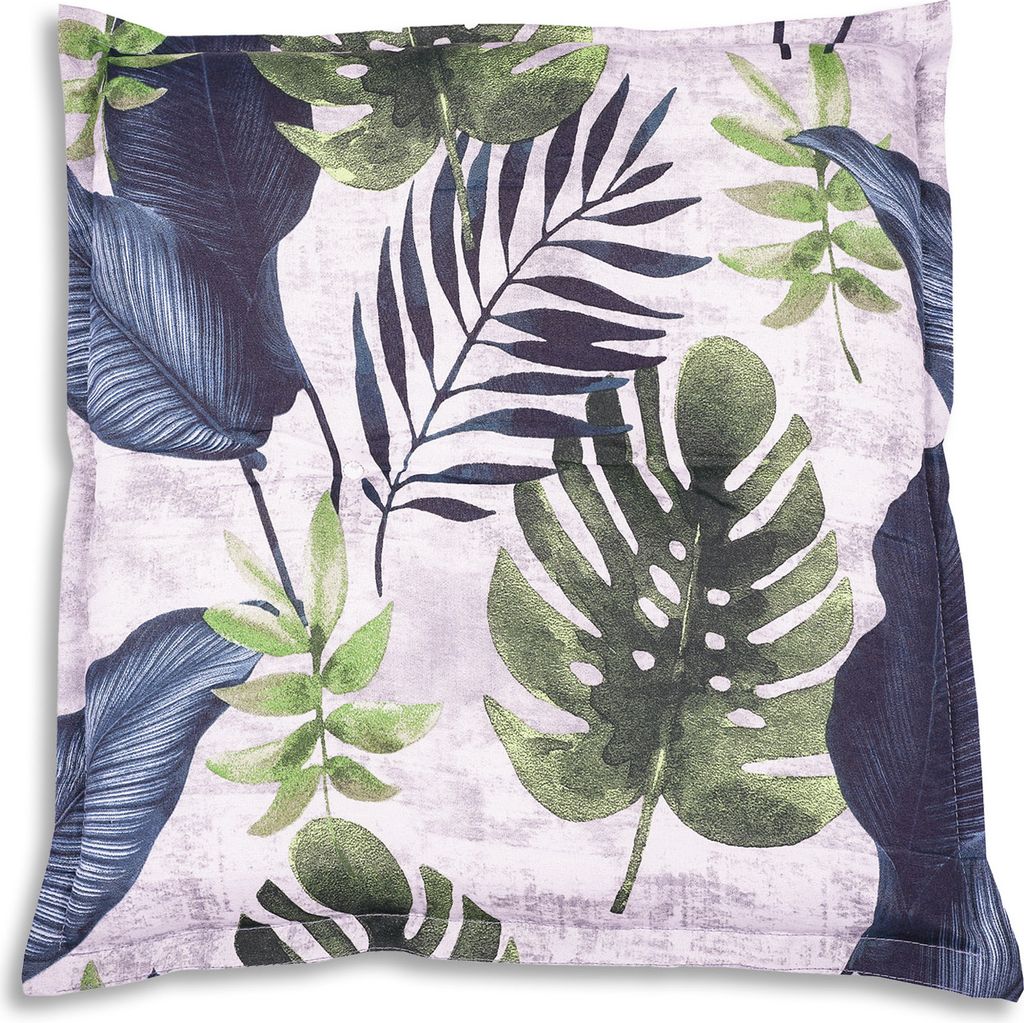 A close-up view of a pillow with a tropical leaf pattern.