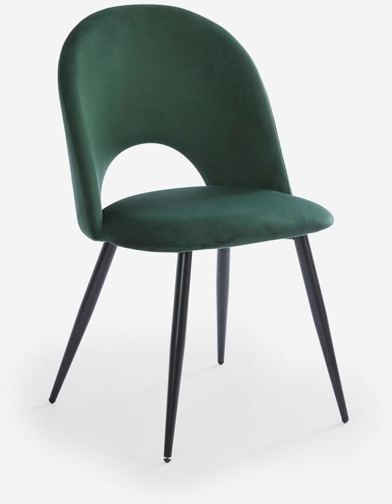 A single dark green velvet chair with black legs on a white background.