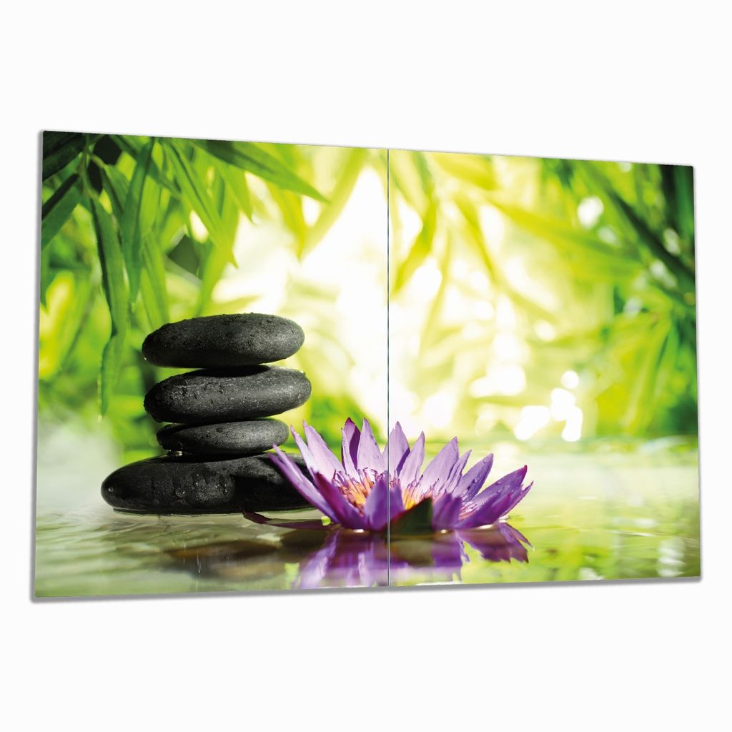 Wallario Herdabdeckplatte aus Glas, Größe 80 x 52 cm 2-teilig, Motiv Steinstapel in schwarz mit Blumenblüte in lila