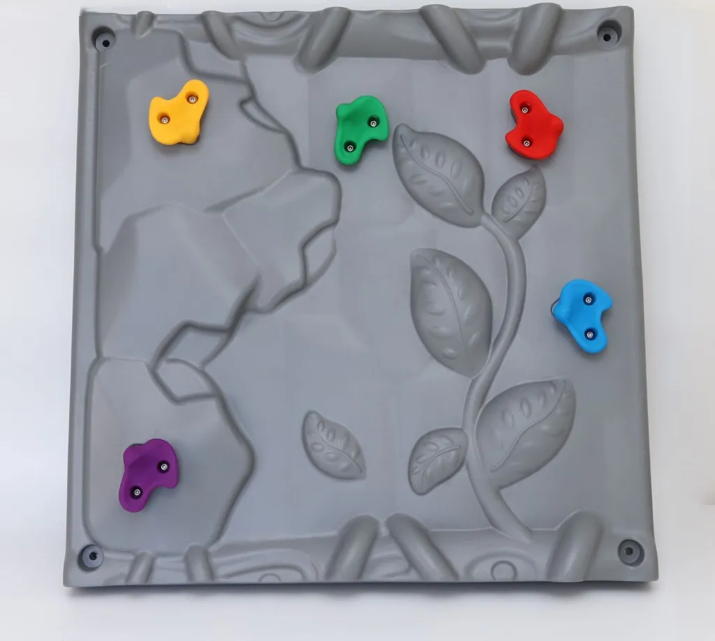 Mur d'escalade gris plastique avec surface antidérapante et durable