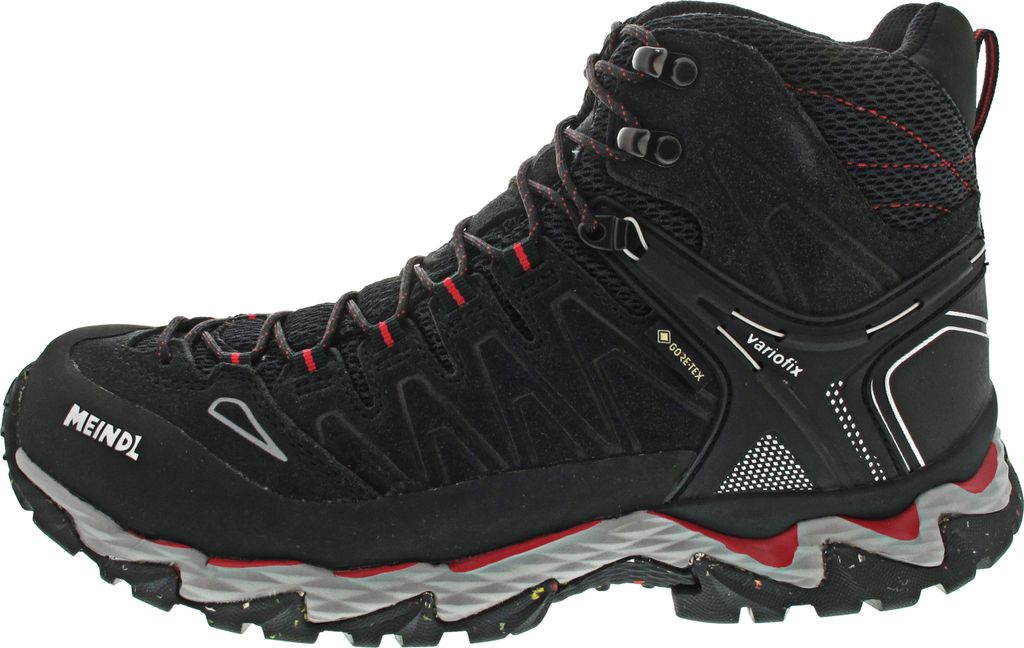 A side view of a black and red hiking boot.
