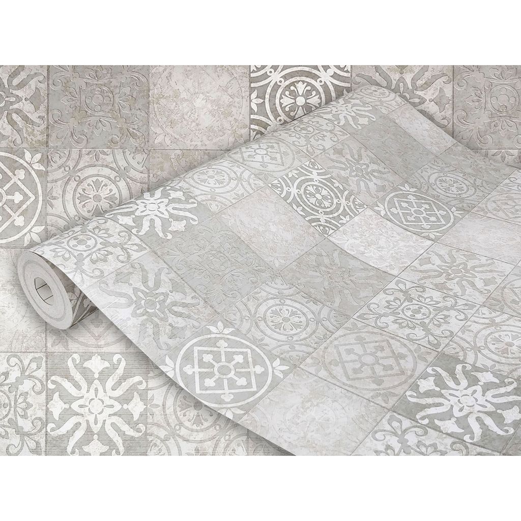 A roll of wallpaper with a tile-like pattern is partially unrolled, showing the design up close.