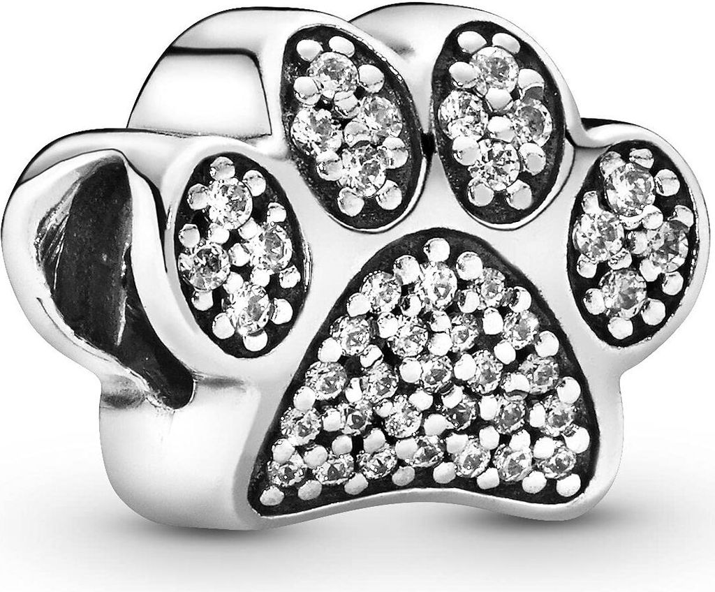 A close-up studio shot of a Pandora paw print charm.