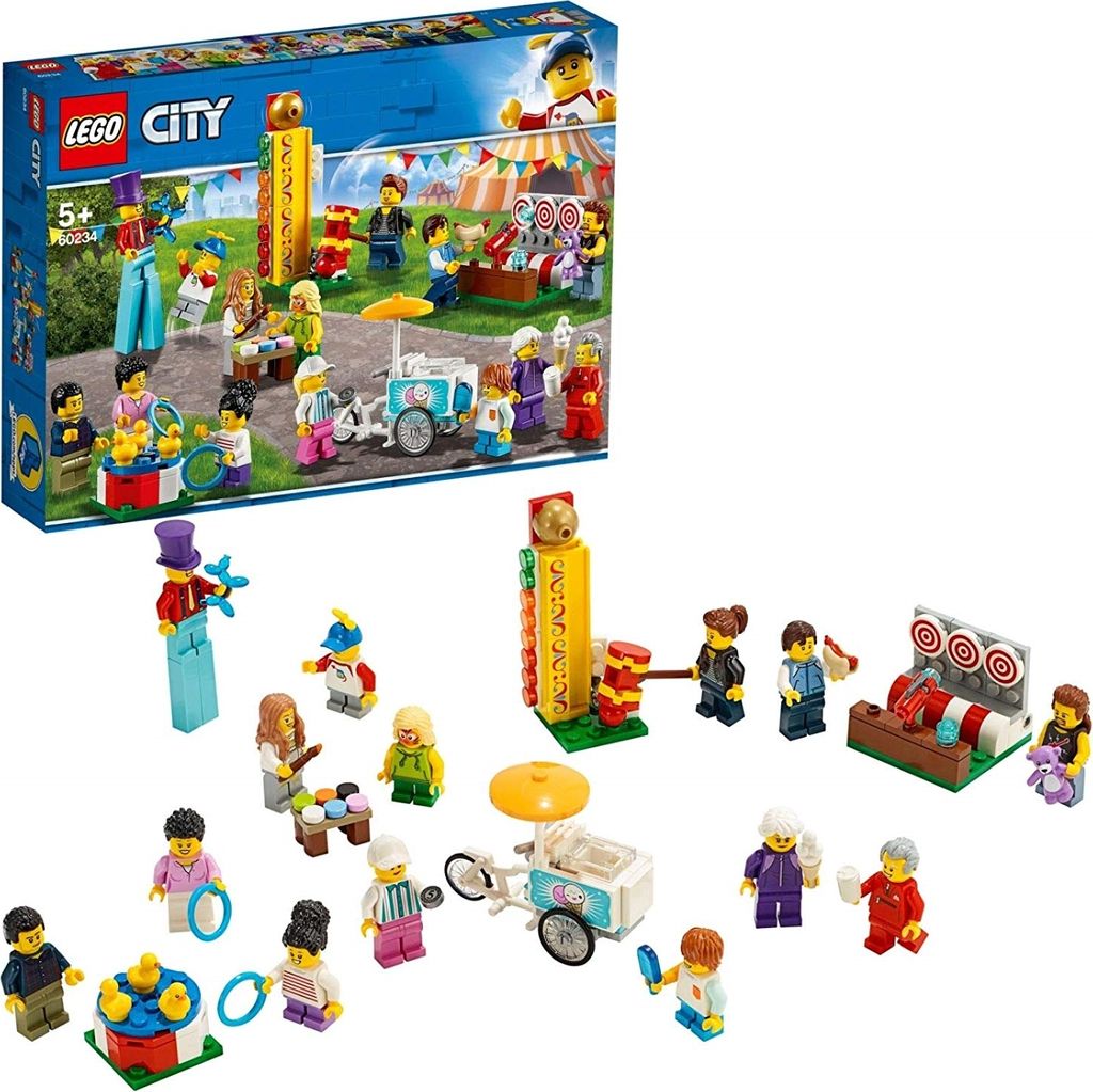 A LEGO City fairground set with various minifigures and attractions.
