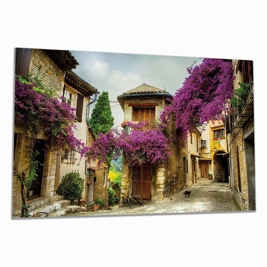 Wallario Herdabdeckplatte aus Glas, Größe 80 x 52 cm 1-teilig, Motiv Malerische Stadt in der Provence mit bunten Blumen
