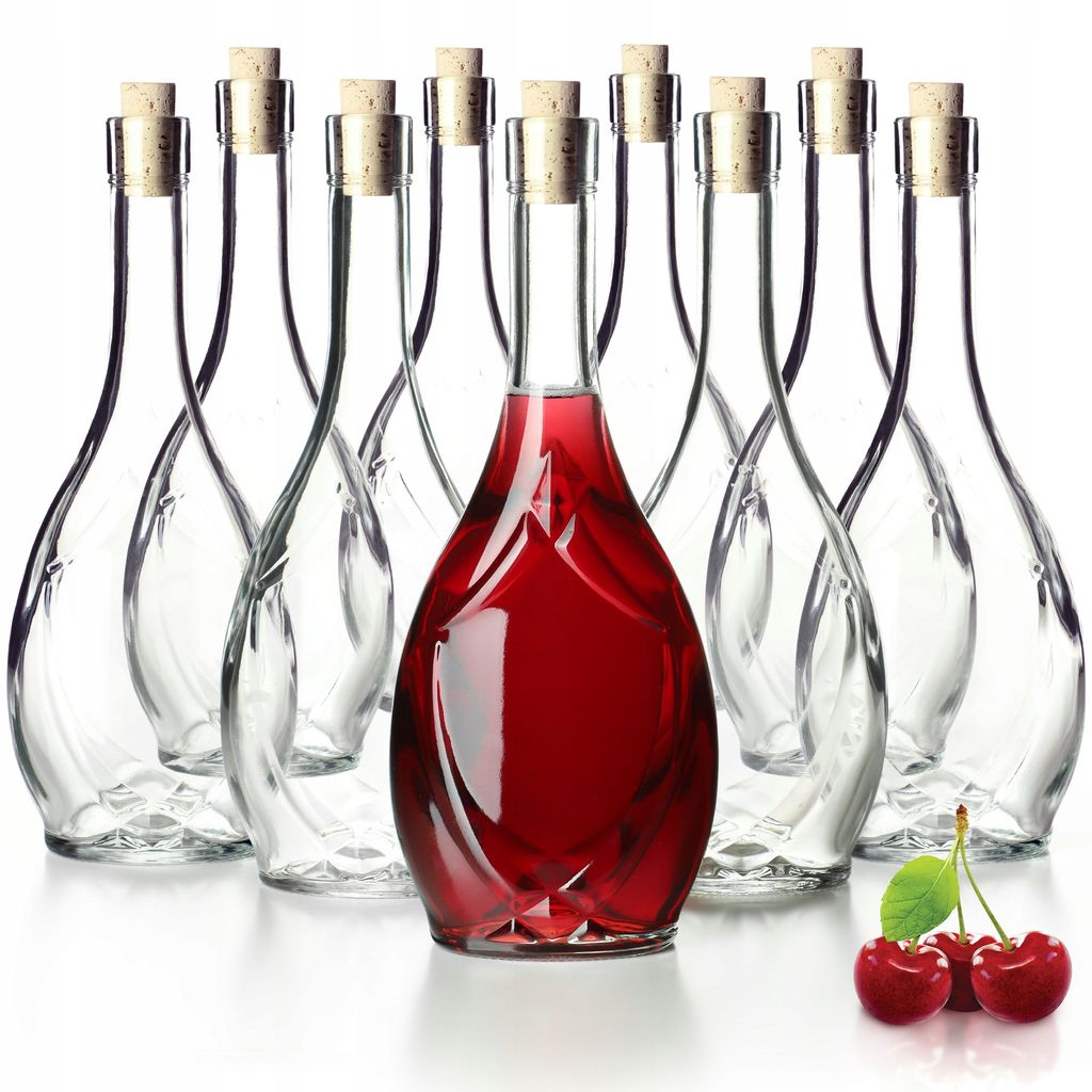 A group of clear glass bottles with cork stoppers, one of which is filled with red liquid. Three cherries are in the foreground.