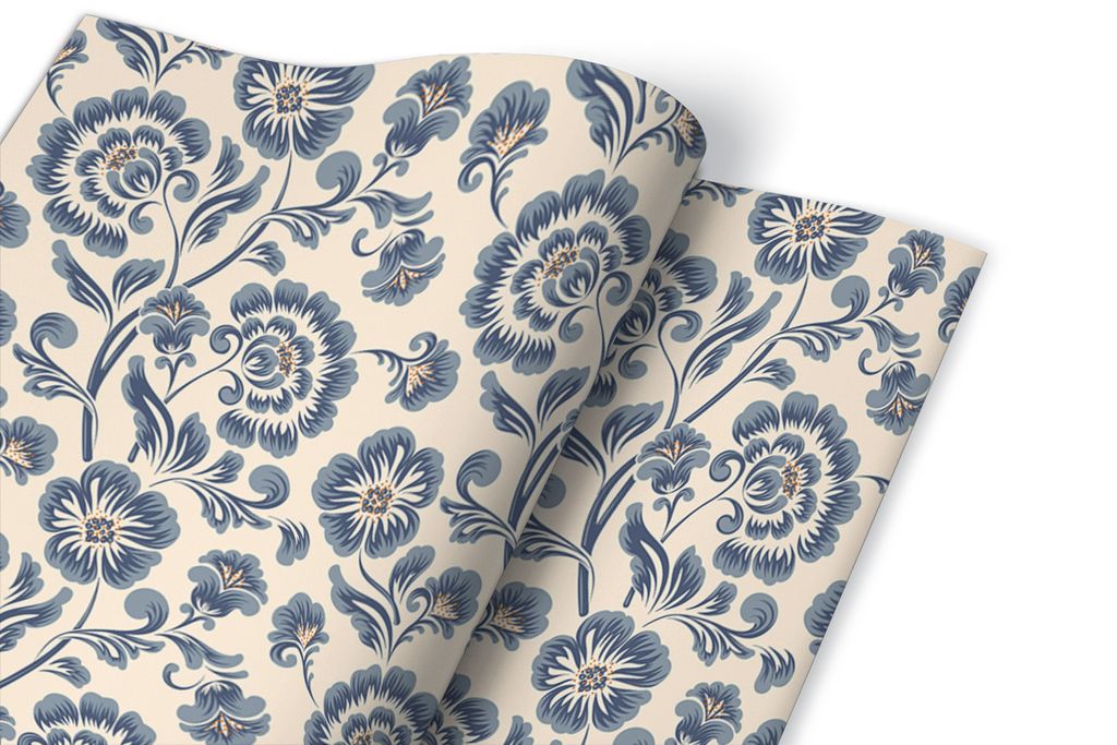 A close-up of a roll of floral patterned adhesive foil.