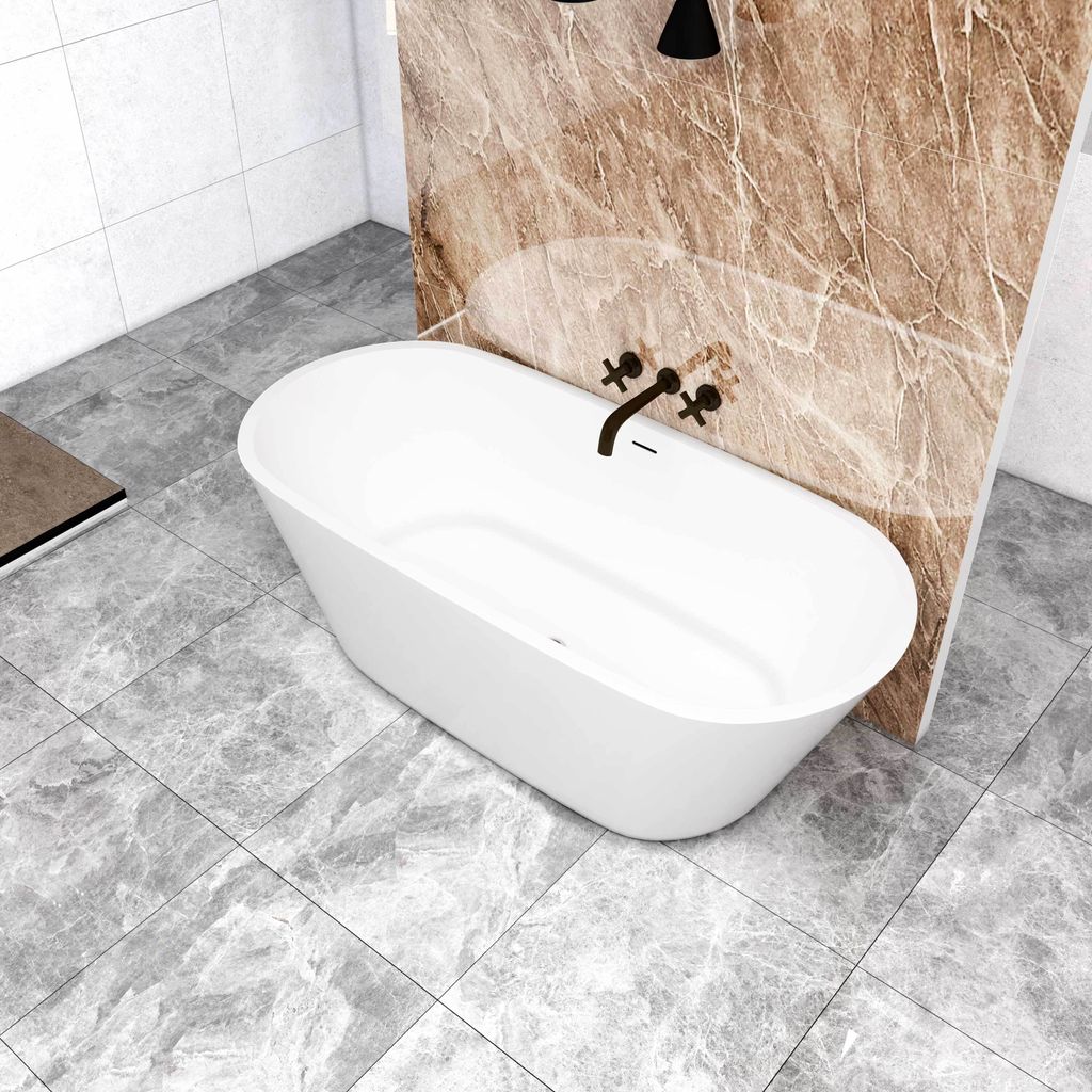 A modern bathroom with a freestanding oval bathtub.