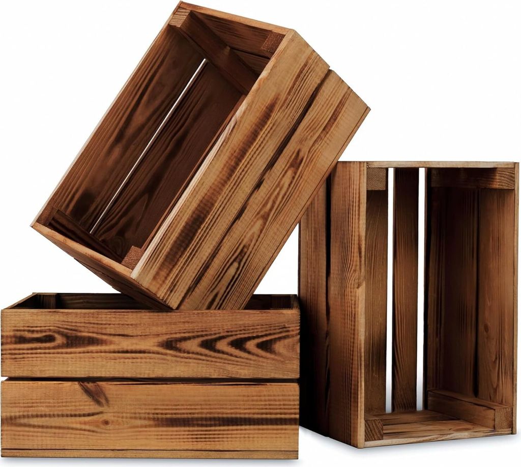 Three wooden crates are stacked and arranged in a visually appealing way against a white background.