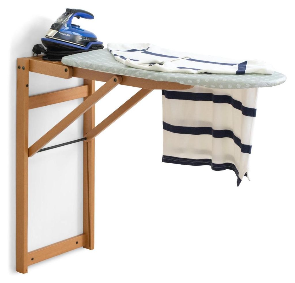 A wall-mounted ironing board with an iron and a striped shirt on it.