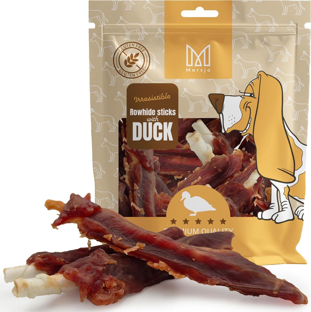 A bag of dog treats with some treats laid out in front.