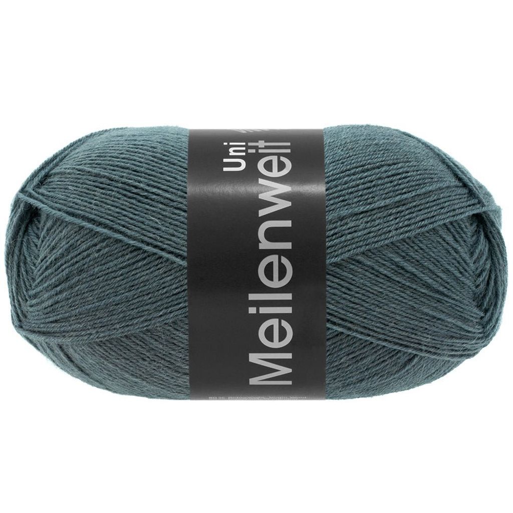 A ball of teal yarn with a black label.