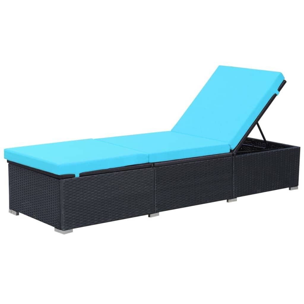 A black rattan sun lounger with a bright blue cushion, shown against a white background.