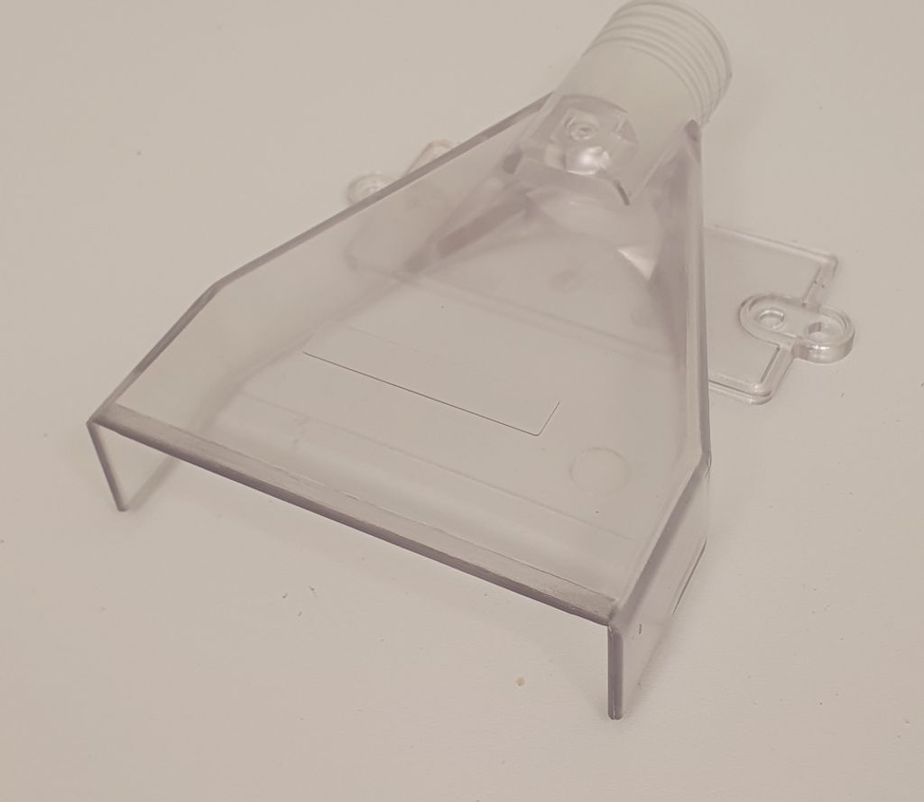 A clear plastic vacuum cleaner attachment is shown on a white background.