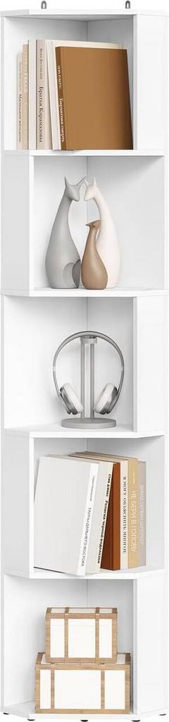 A white corner shelf unit displaying books, decorative items, and headphones.