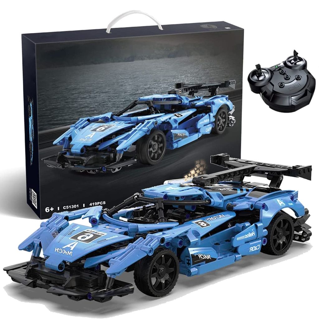 A blue remote-controlled sports car building set, shown with its packaging and remote control.