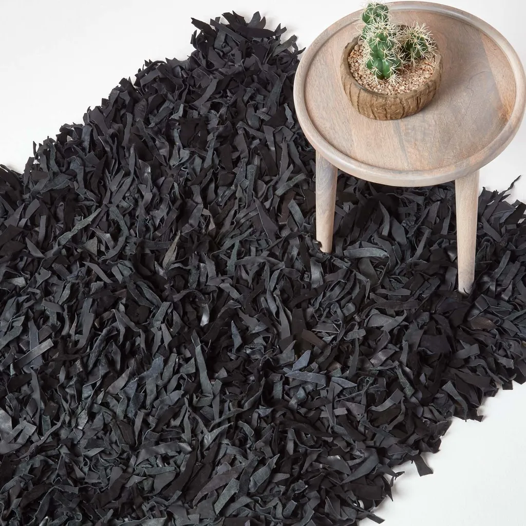 Tapis de salon en cuir véritable tressé main noir 90x150 cm Dallas robuste