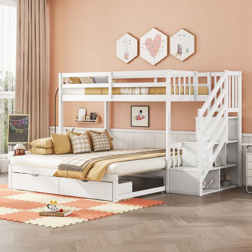 A child's bedroom with a white bunk bed, trundle, and stairs, decorated with wall art and curtains.