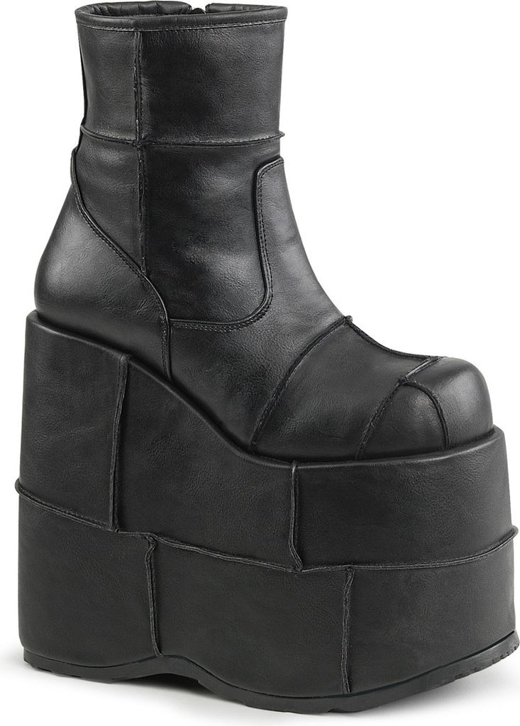 A black platform boot with a thick sole, shown from the side against a white background.