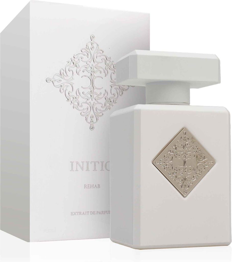 A white perfume bottle and its packaging are displayed against a white background.