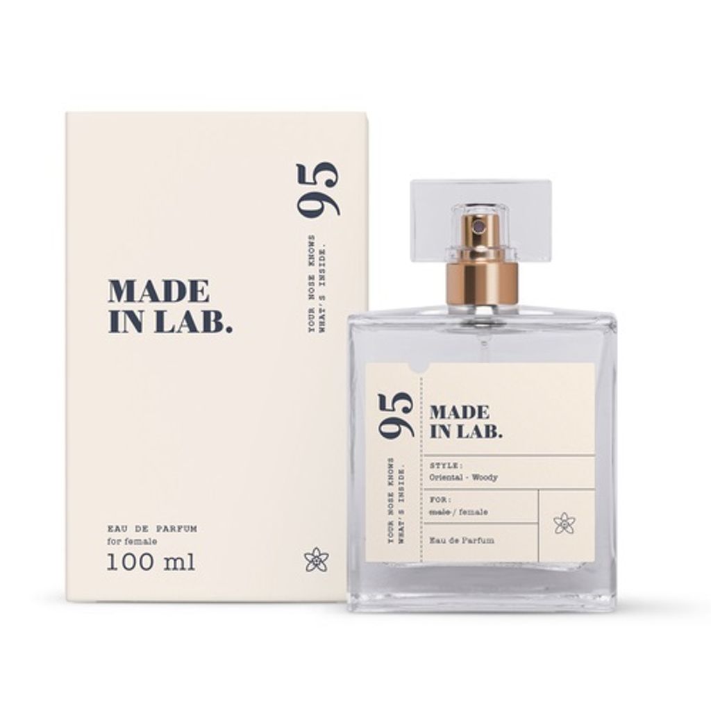 A bottle of perfume and its packaging are displayed against a white background.