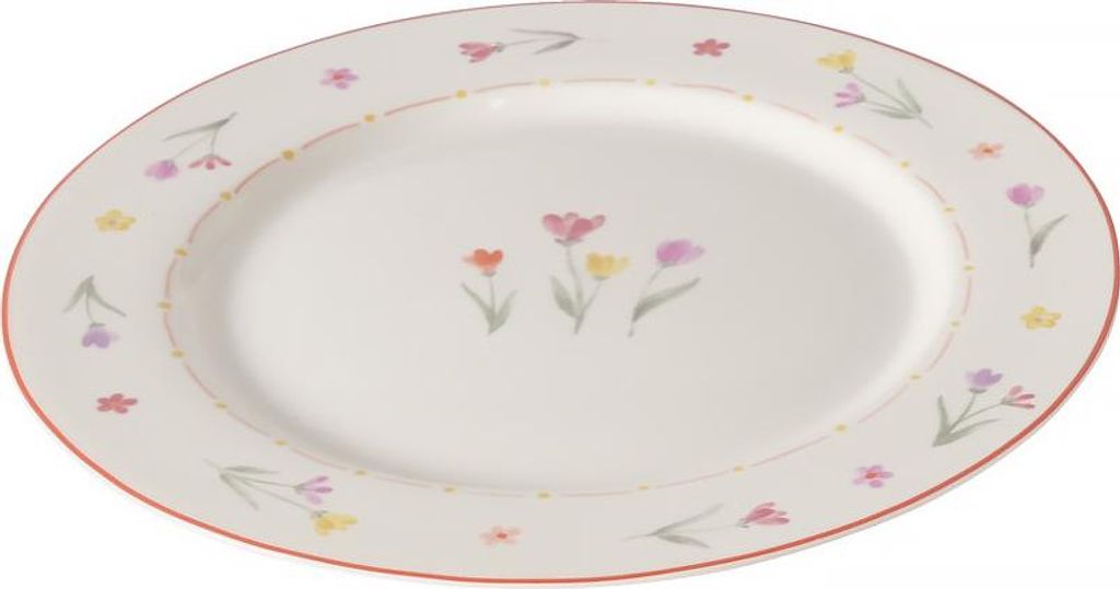 A white oval plate with a delicate floral pattern around the rim and in the center.